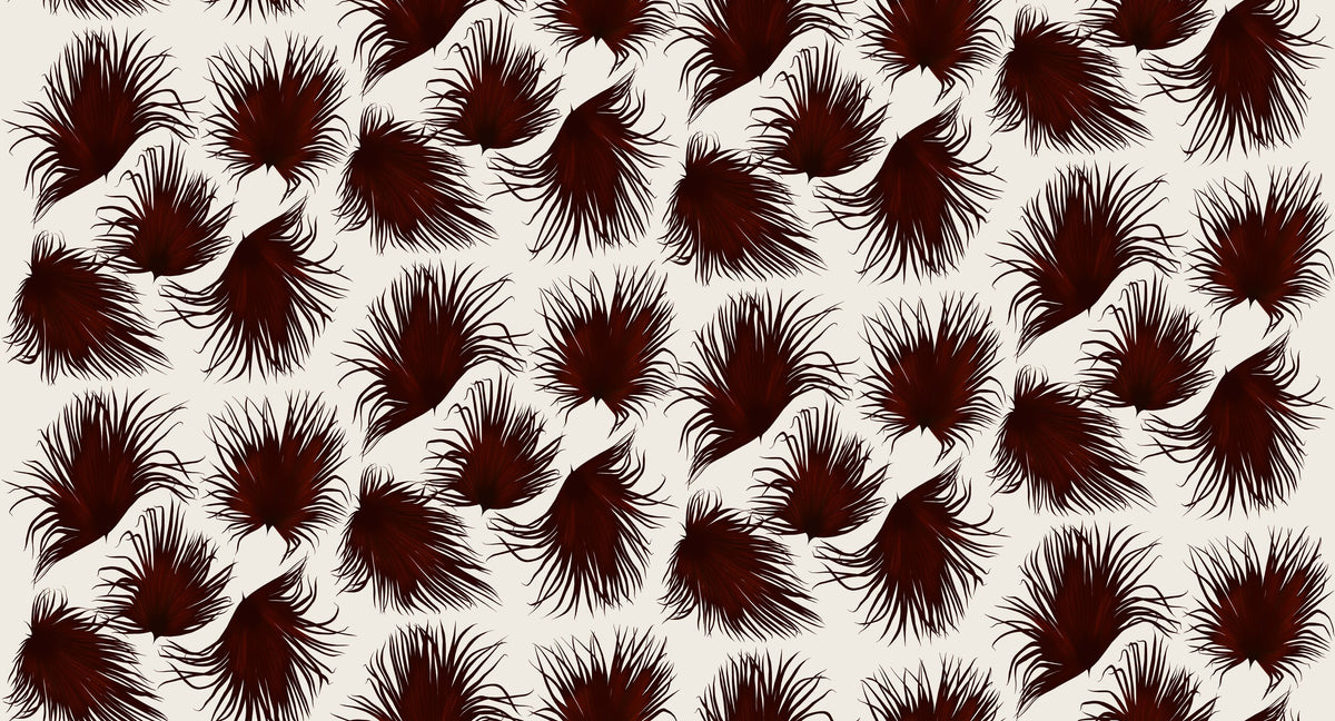 Papier peint Jardin d'Alizés noix de coco d'Amélie Noël représentant un motif répétitif de feuillages tropicaux aux formes graphiques.