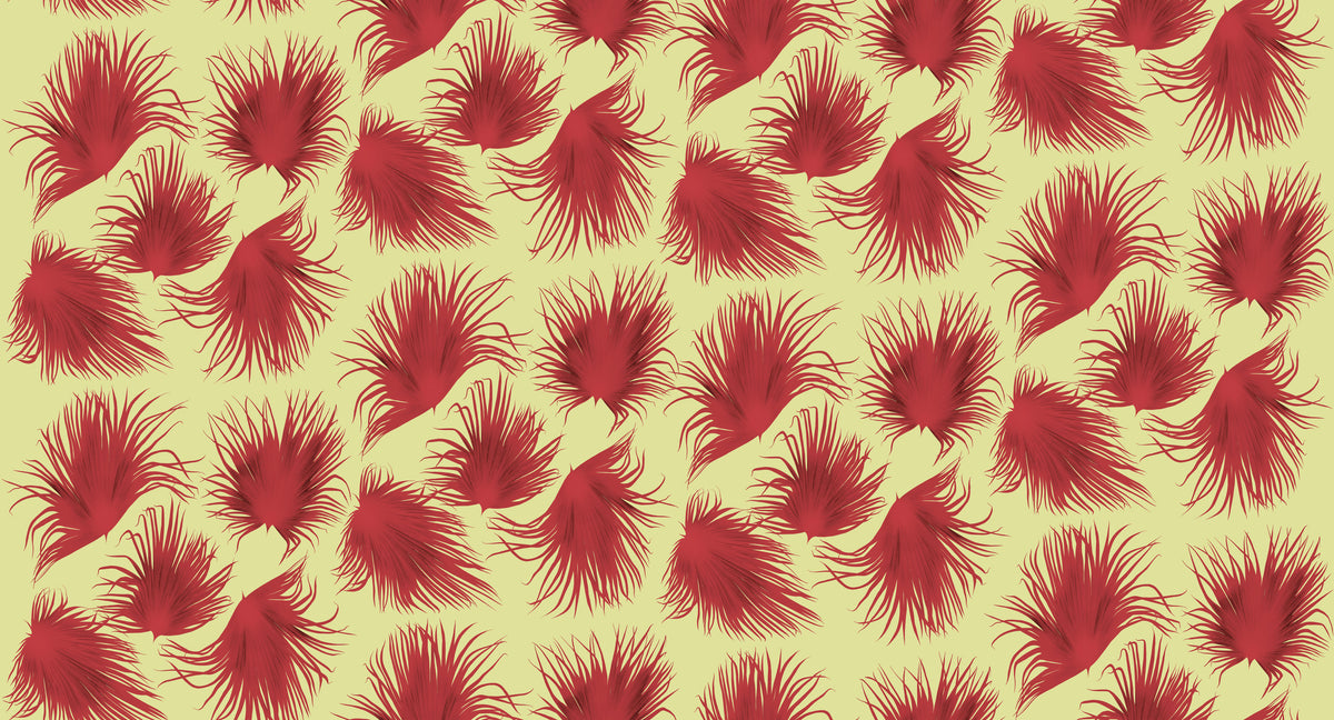 Papier peint Jardin d'Alizés rose d'Amélie Noël représentant un motif répétitif de feuillages tropicaux aux formes graphiques.